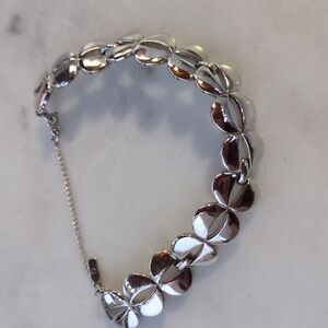 vintage Monet silver-tone link bracelet with a safety chain. 